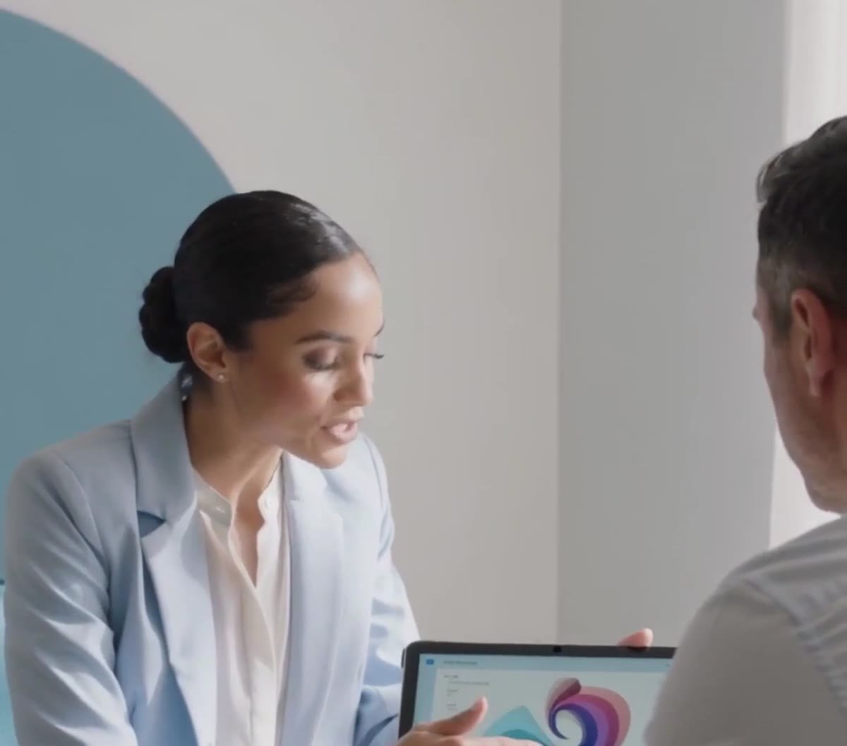 Clinician reviewing results with a patient during a kidney health checkup