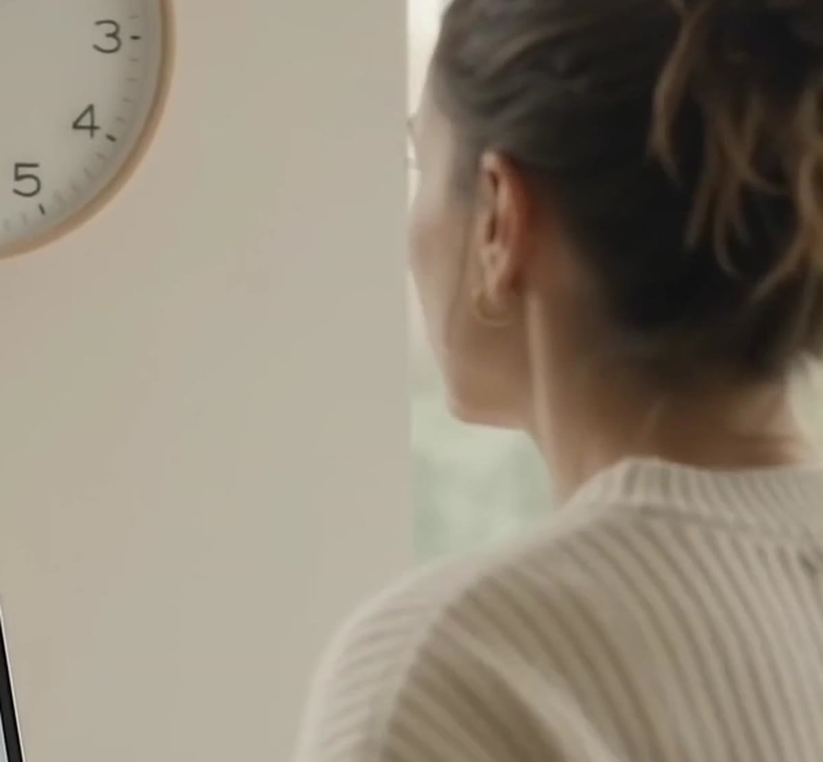 Woman at home looking out a window: most people with prediabetes feel no symptoms
